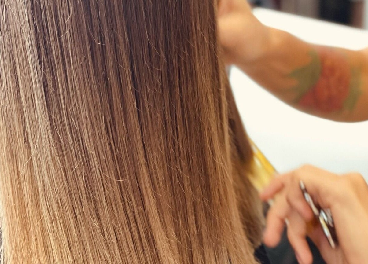 Client getting a sleek haircut at Sukar in Playa del Carmen, Quintana Roo, MX.