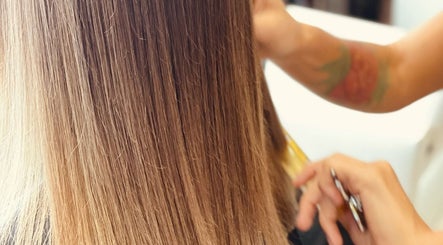 Client getting a sleek haircut at Sukar in Playa del Carmen, Quintana Roo, MX.