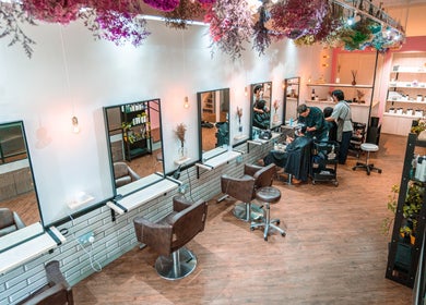 Interior view of Ha Lu Hair Design salon at Singapore, Singapore, SG showcasing modern styling stations.