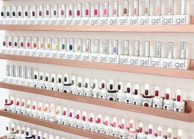 Nail polish collection at Bella Vida Beauty Rooms, Ingleby Barwick, England, GB. Organized gel colors on shelves.
