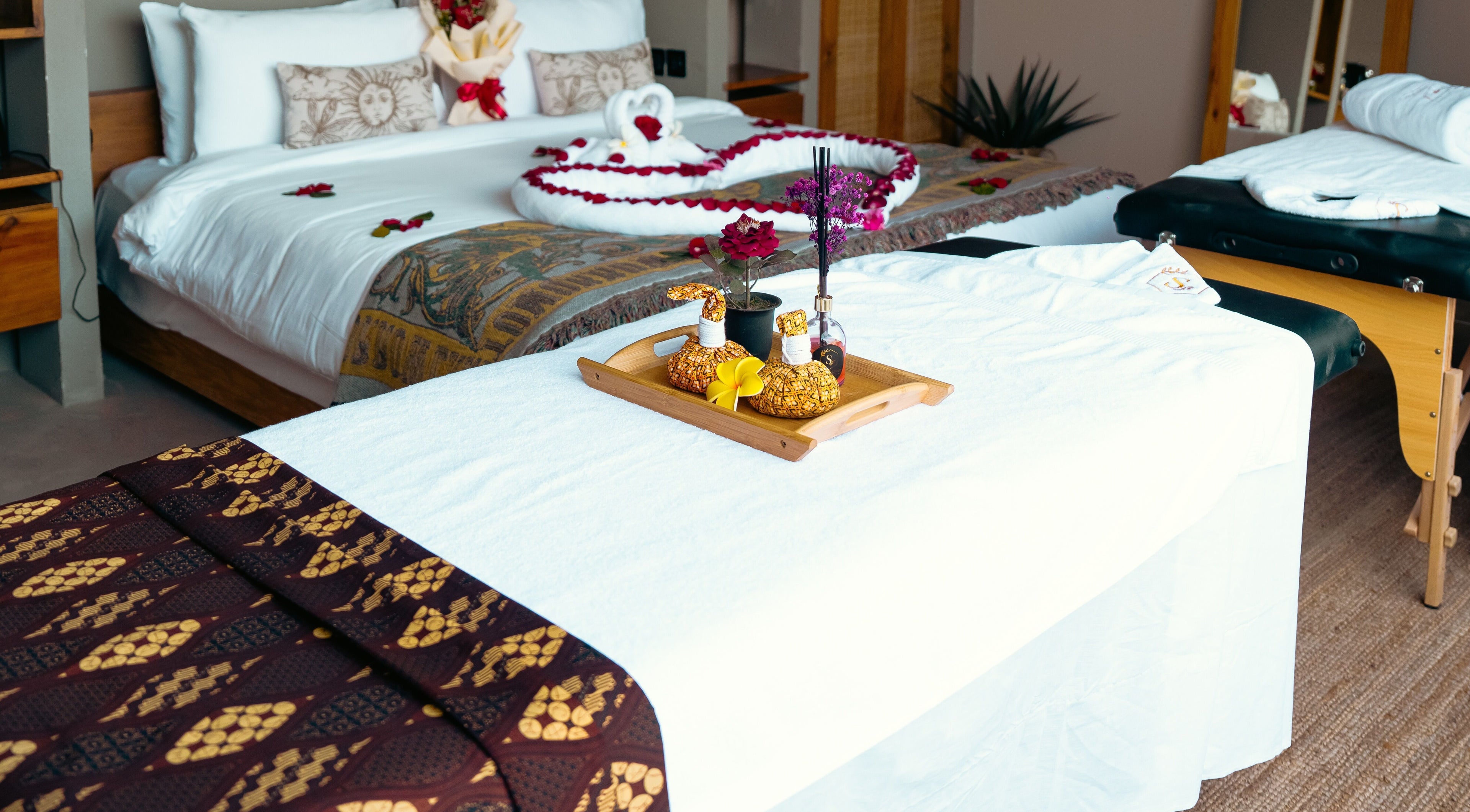 Tranquil spa setup at Sahara Balinese Spa & Salon - Home Service in Dubai, Dubai, AE with luxurious linens.