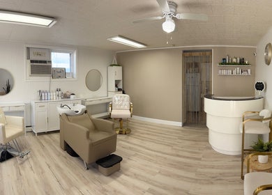 Elegant interior of Elevate Salon Llc in Alpena, Michigan, US featuring modern chairs and shelves with beauty products.