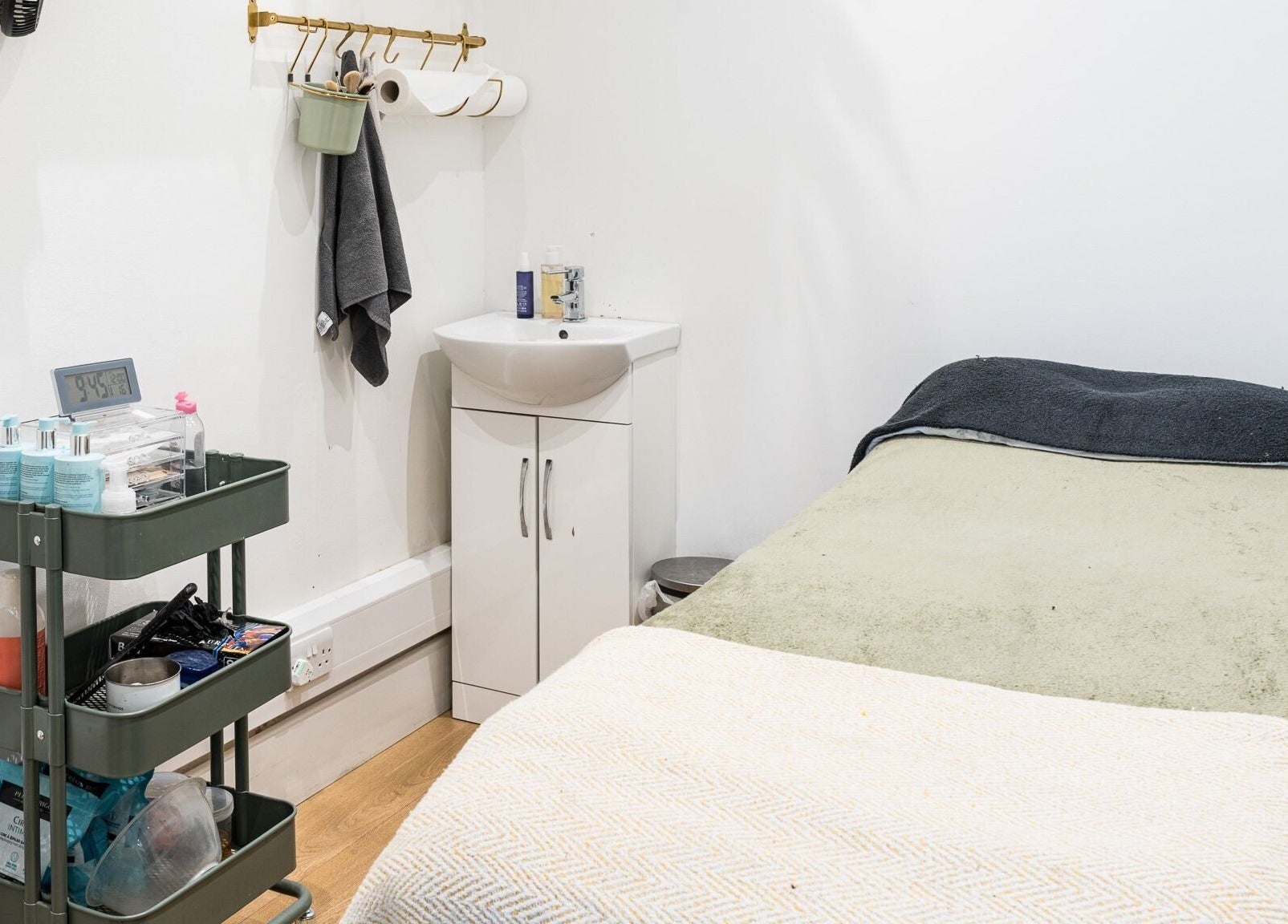 Peaceful therapy room at No 53 Salon, Walton on the Hill, England, GB with cozy bed and essentials.