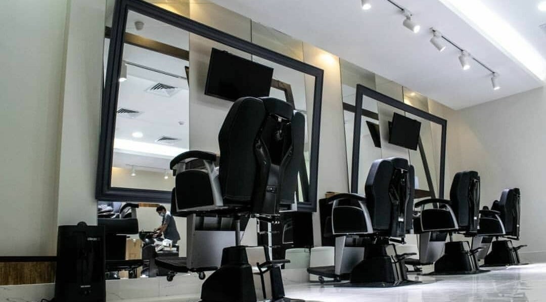 Modern styling chairs at Super Star Gents Salon Al Jerf 2, Ajman, Ajman, AE offering premium grooming services.