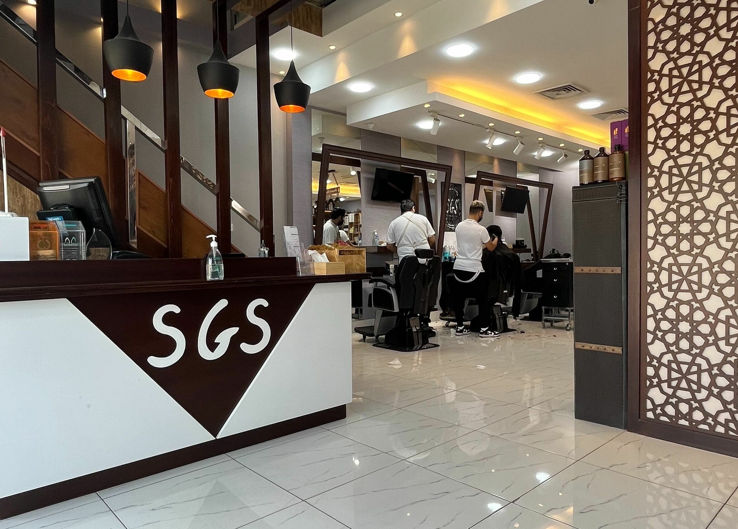 Super Star Gents Salon Al Jerf 2 in Ajman, AE featuring sleek design and professional styling service.