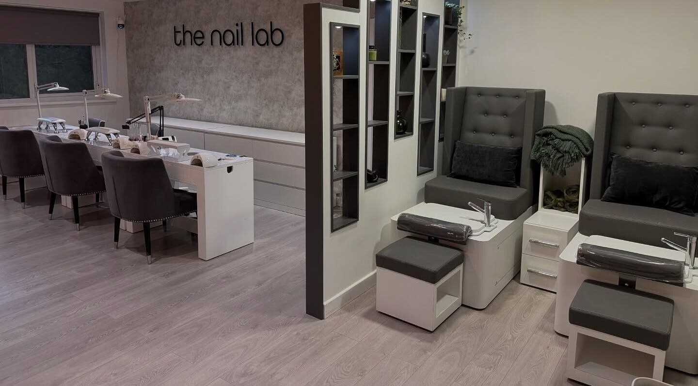 Elegant interior of The Nail Lab in Leeds, England, GB with modern manicure and pedicure stations.