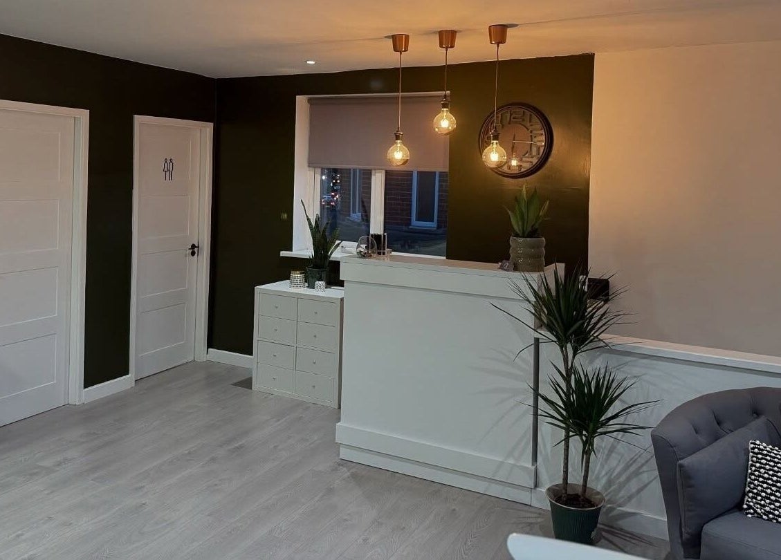 Elegant reception area at The Nail Lab, Leeds, England, GB, featuring modern decor and soft lighting.