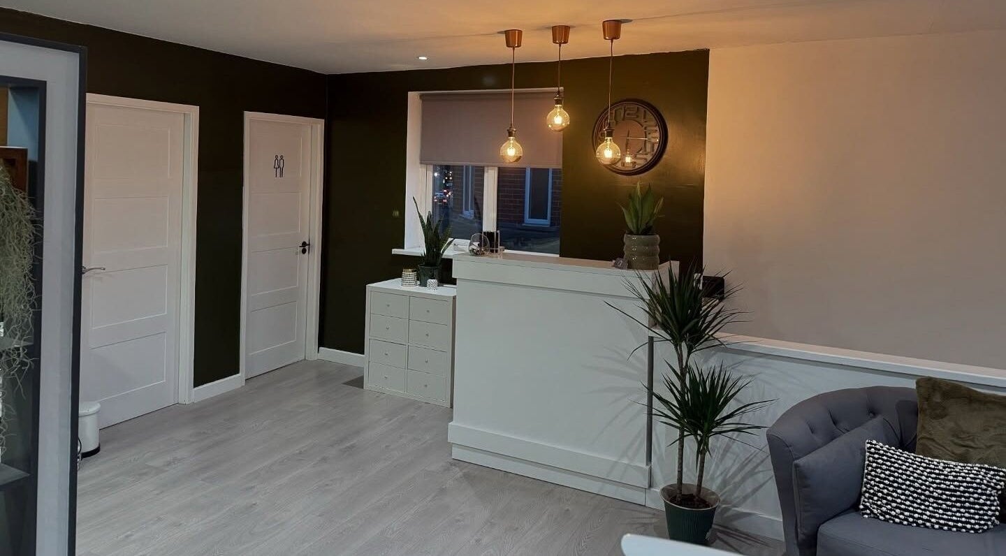 Elegant reception area at The Nail Lab, Leeds, England, GB, featuring modern decor and soft lighting.