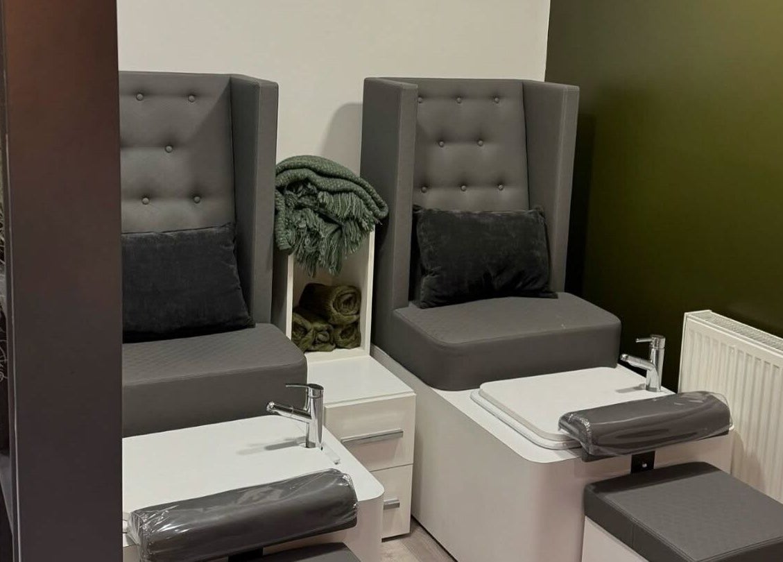 Comfortable pedicure chairs at The Nail Lab in Leeds, England, GB, offering a relaxing spa experience.