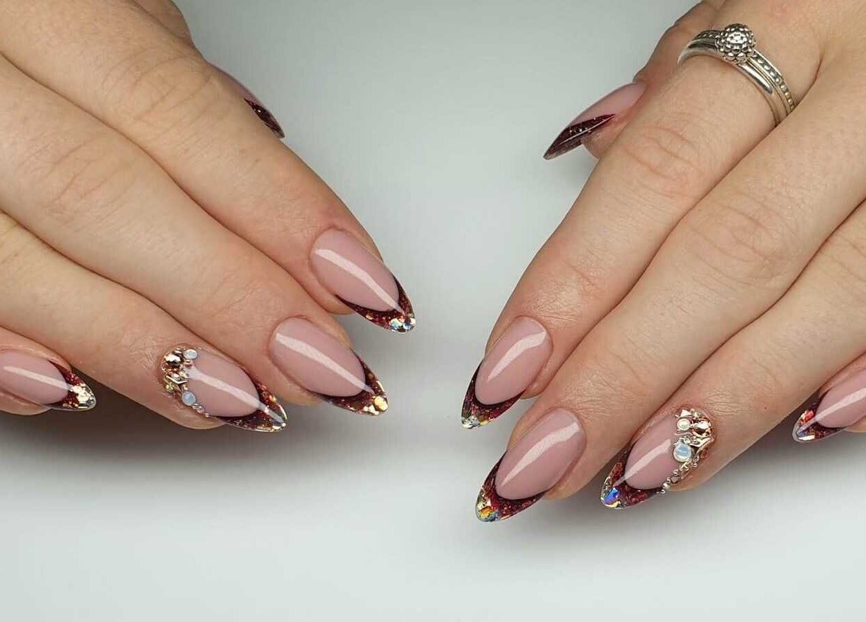 Elegant manicured nails with detailed gems at The Nail Lab, Leeds, England, GB.
