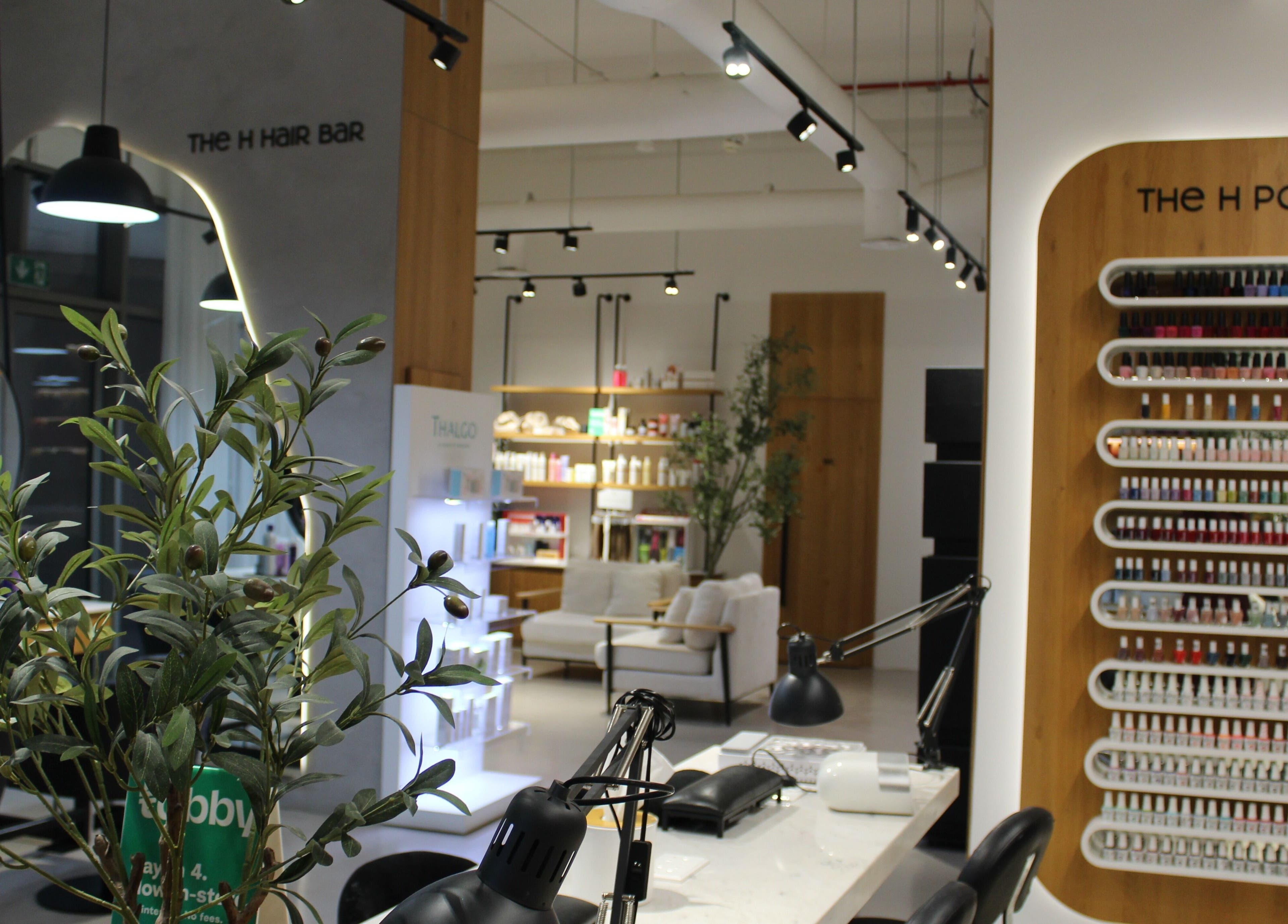 Modern interior of The H Ladies Beauty Salon - L.L.C - O.P.C, Abu Dhabi, Abu Dhabi, AE with nail polish bar.