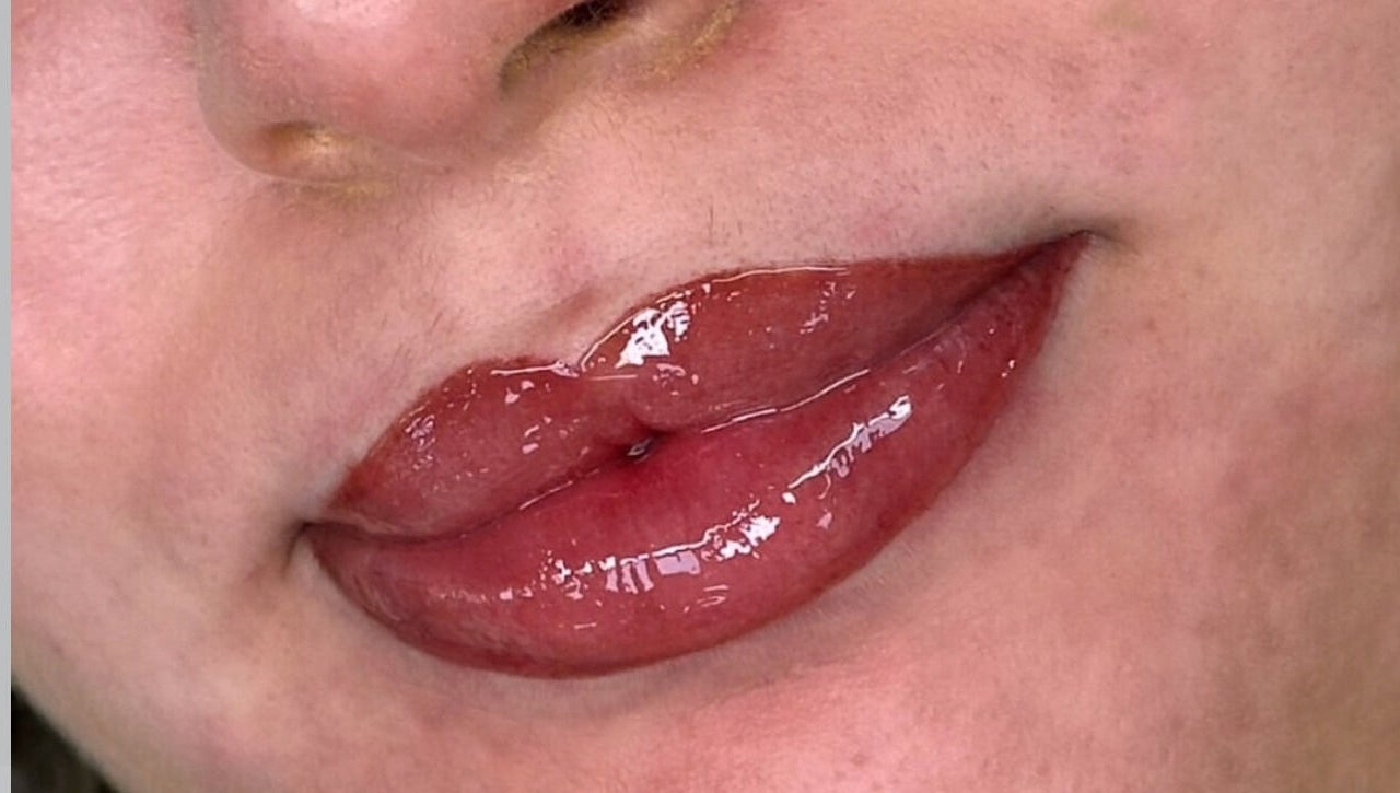 Close-up of glossy lips showcasing Diamond Artistry's beauty work in Halfway, England, GB.