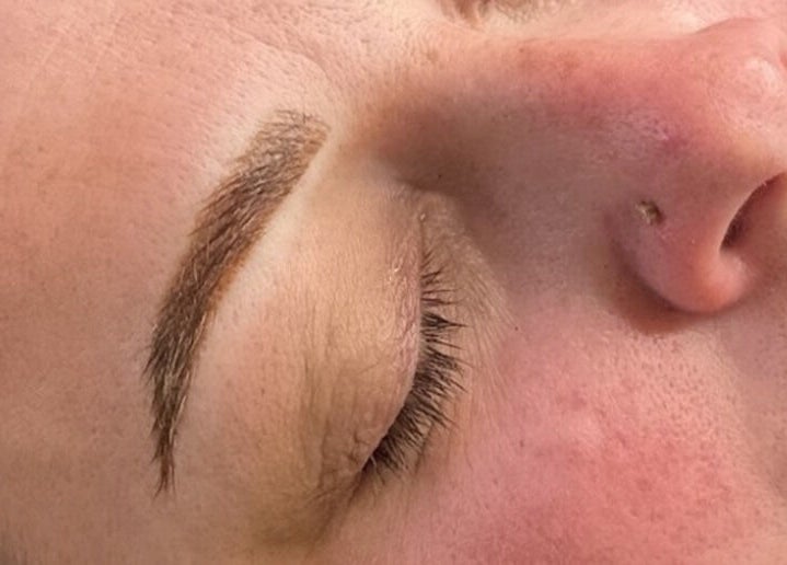 Close-up of sculpted eyebrows at Diamond Artistry, Halfway, England, GB showcasing natural beauty.