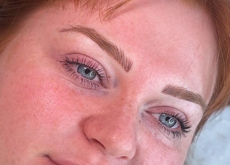 Close-up of beautifully done eyebrows and lashes by Diamond Artistry in Halfway, England, GB.