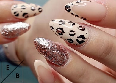 Stylish leopard print and glitter nails at Enchanted Belle, Boksburg, Gauteng, ZA.