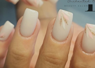 Elegant nail art with gold accents at Enchanted Belle, Boksburg, Gauteng, ZA.