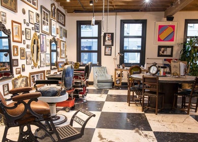 Chic vintage interior of Esstudio Galleria in Chippendale, New South Wales, AU, featuring stylish barber chairs.