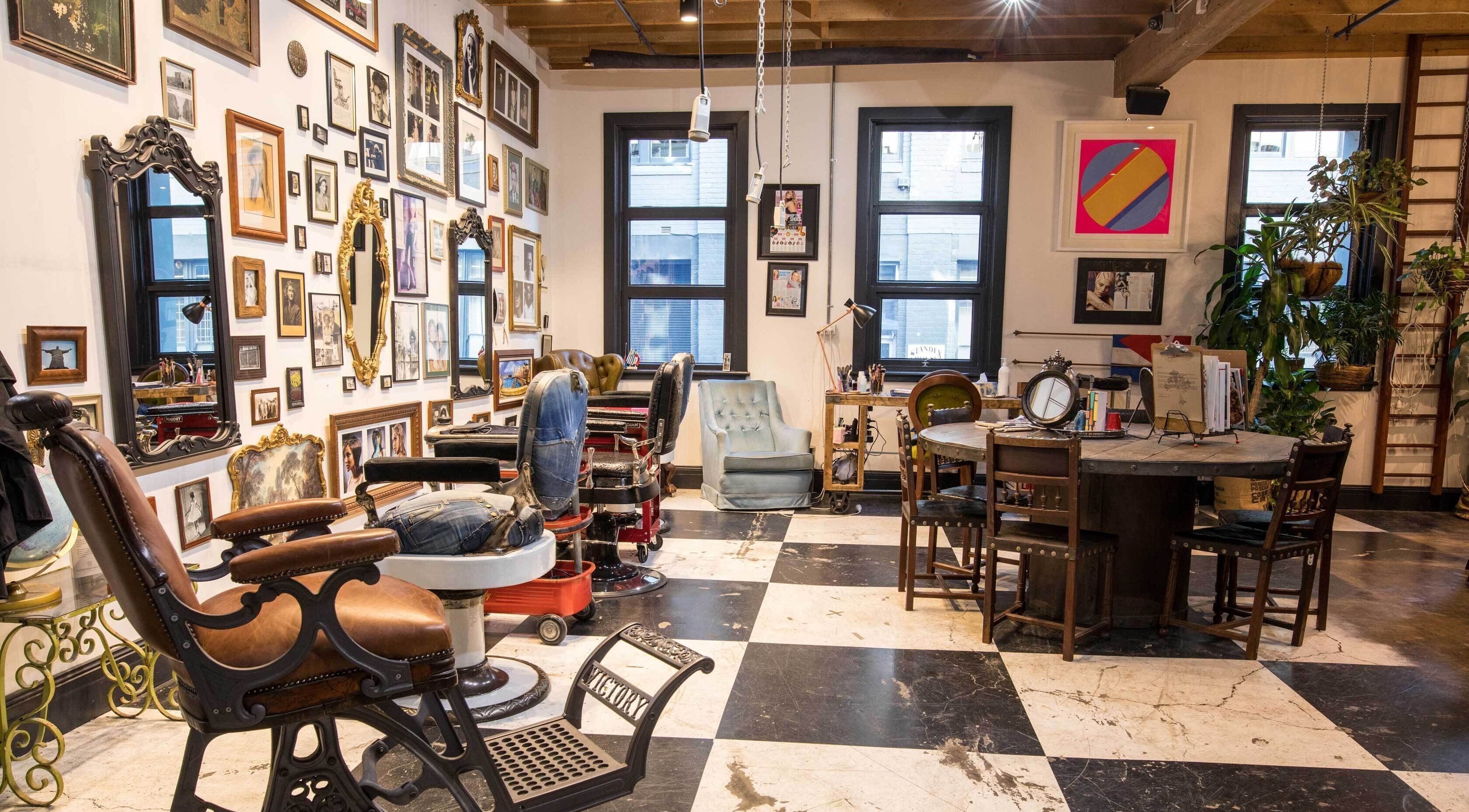 Chic vintage interior of Esstudio Galleria in Chippendale, New South Wales, AU, featuring stylish barber chairs.