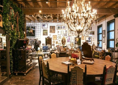 Elegant interior of Esstudio Galleria, Chippendale. Features vintage decor and grand chandelier.