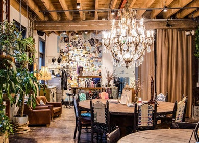 Stylish interior of Esstudio Galleria in Chippendale, New South Wales, with chandelier and rustic decor.