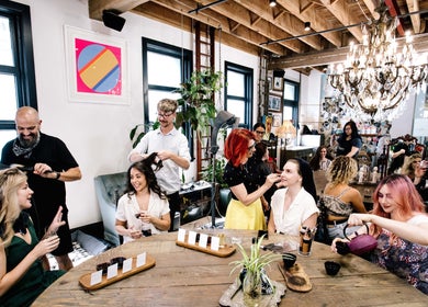 Guests enjoying styling and makeup sessions at Esstudio Galleria, Chippendale, New South Wales, AU.
