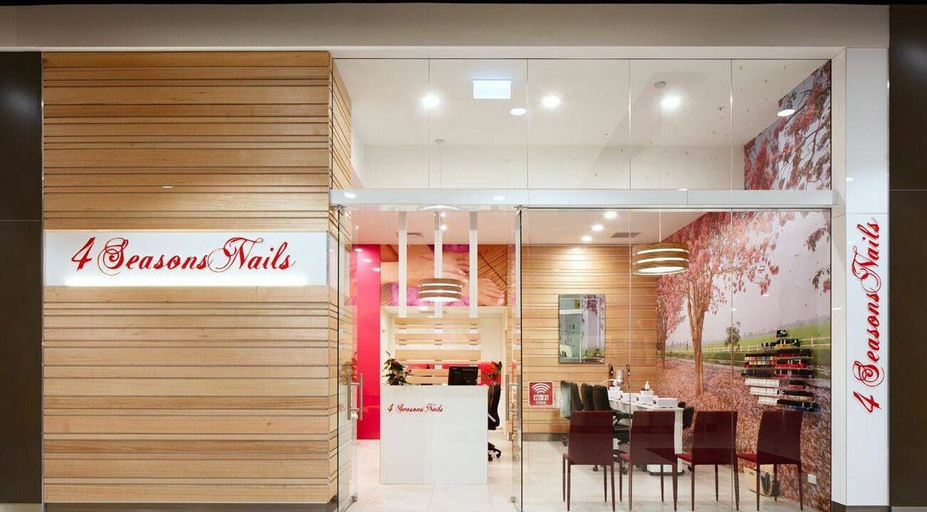 4 Seasons Nails Queensgate entrance in Lower Hutt, Wellington, NZ showcasing elegant decor and nail polish display.