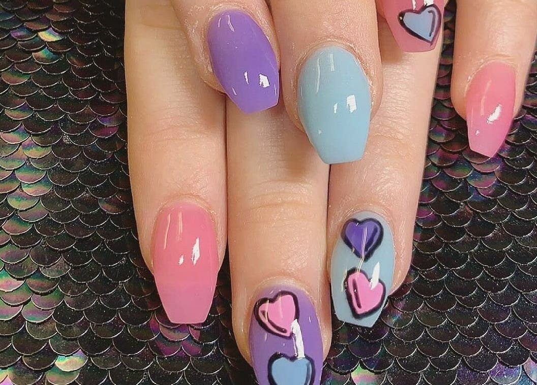 Colorful nail art with heart designs at 4 Seasons Nails Queensgate, Lower Hutt, Wellington, NZ.