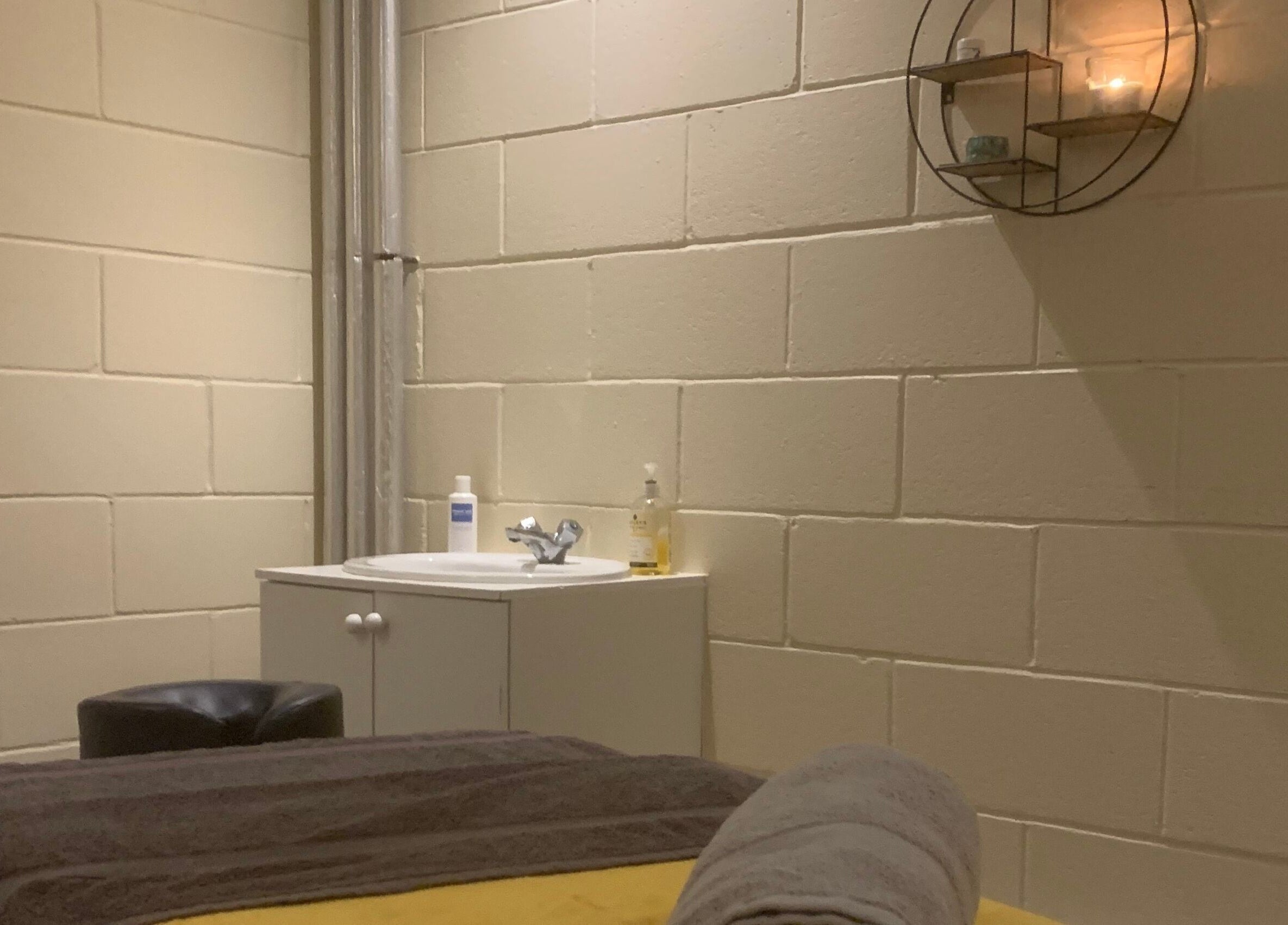 Tranquil treatment room at Fois - Mercat Gait Centre, Prestonpans, Scotland, GB with ambient lighting.