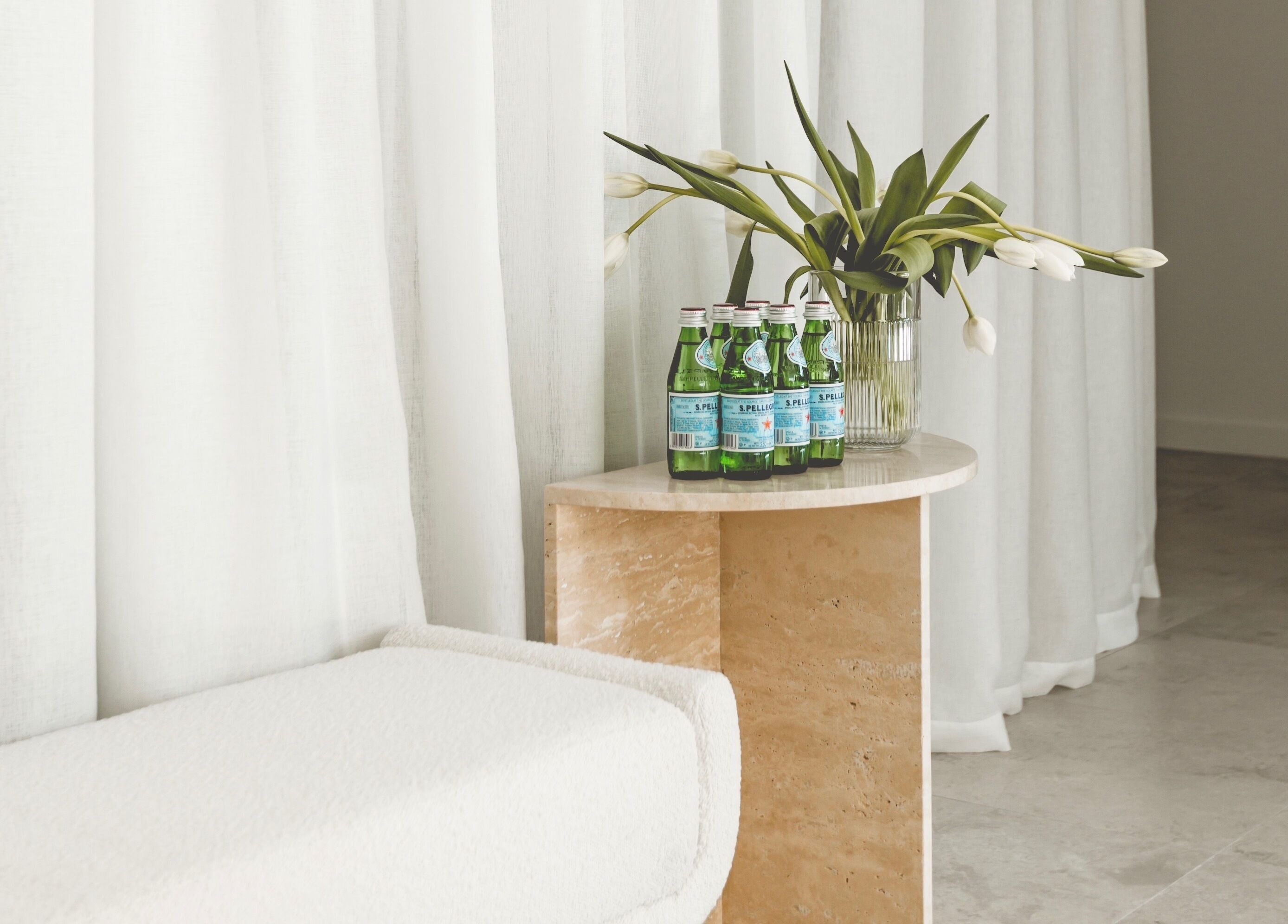 Elegant corner with flowers and drinks at Brow Foxx Wollongong, Corrimal, New South Wales, AU.