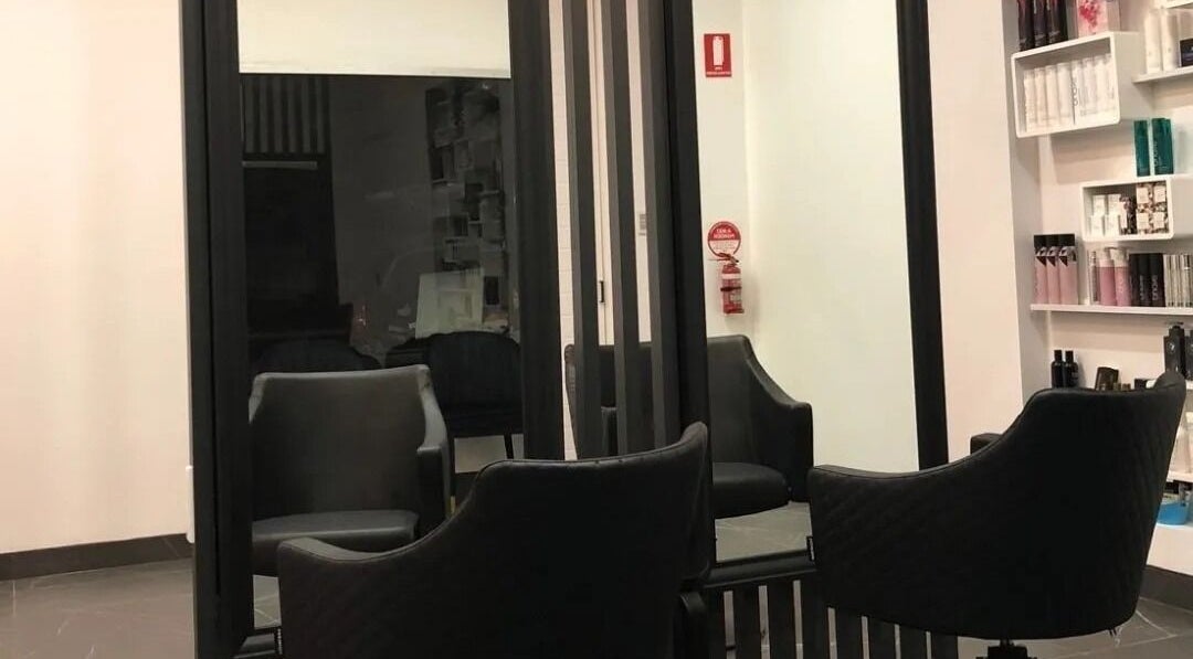 Chic salon chairs at Del La Rouge Hair, Beauty & Spa in Caringbah, New South Wales, AU, showcasing elegance.