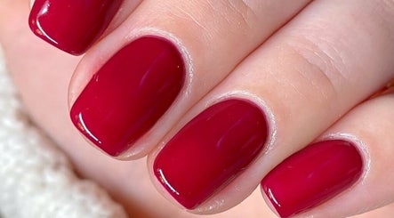 Crimson nails polished to perfection at Refined Beauty By Roxanne in Reigate, England, GB.