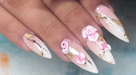 Stylish floral nail art at Mermaid Cove Hair & Beauty in Southampton, England, GB.
