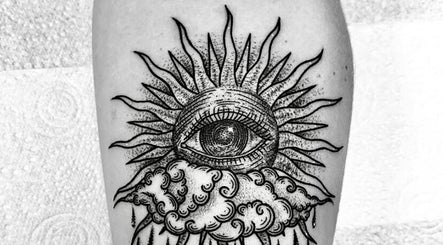 Unique sun and eye tattoo design at BeniSpirit.Art in Stockton-on-Tees, England, GB.