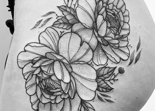 Intricate floral tattoo detail at BeniSpirit.Art in Stockton-on-Tees, England, GB.