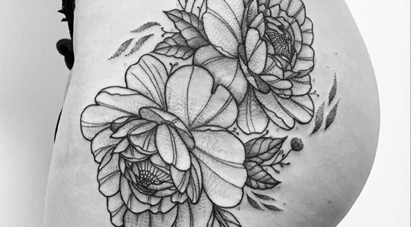 Intricate floral tattoo detail at BeniSpirit.Art in Stockton-on-Tees, England, GB.