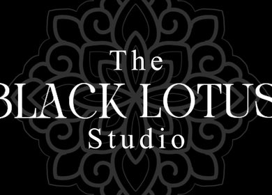 Elegant emblem for The Black Lotus Studio in Yarm, England, GB on a dark floral background.