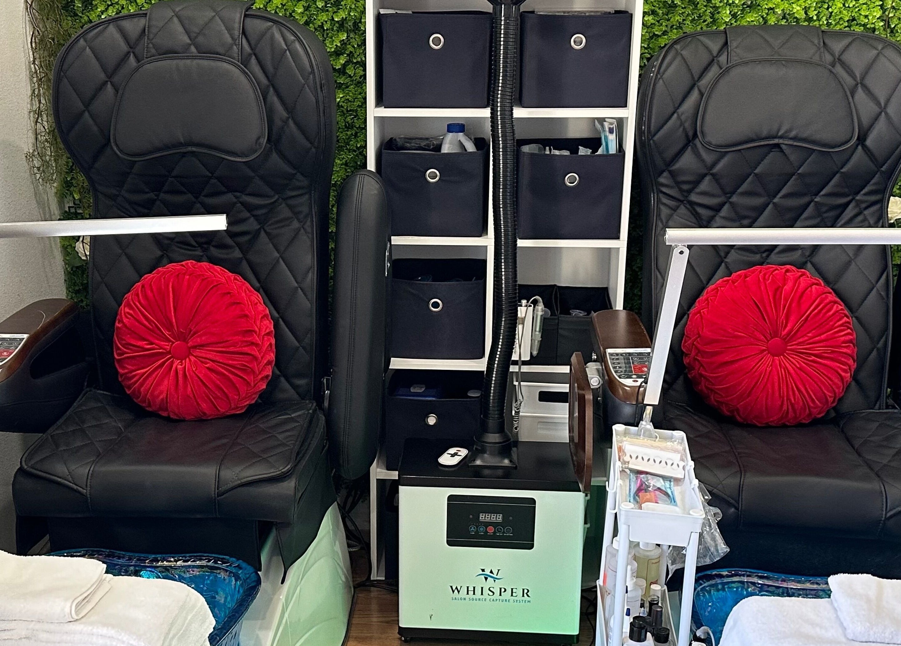 Elegant pedicure chairs at Lovely Me Nail Studio in Laredo, Texas, US, showcasing comfort and style.