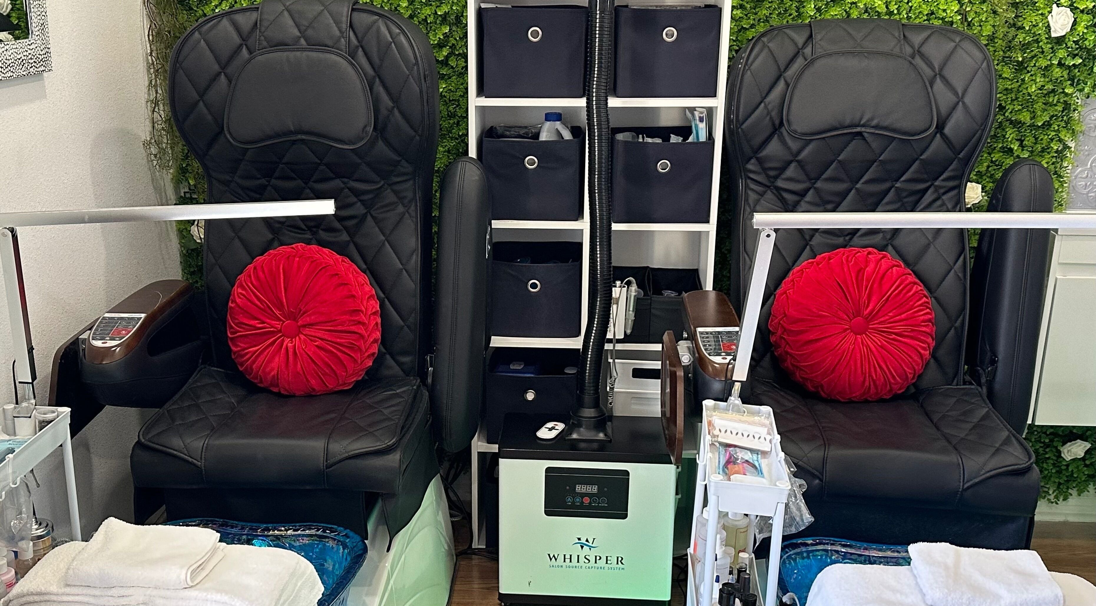 Elegant pedicure chairs at Lovely Me Nail Studio in Laredo, Texas, US, showcasing comfort and style.