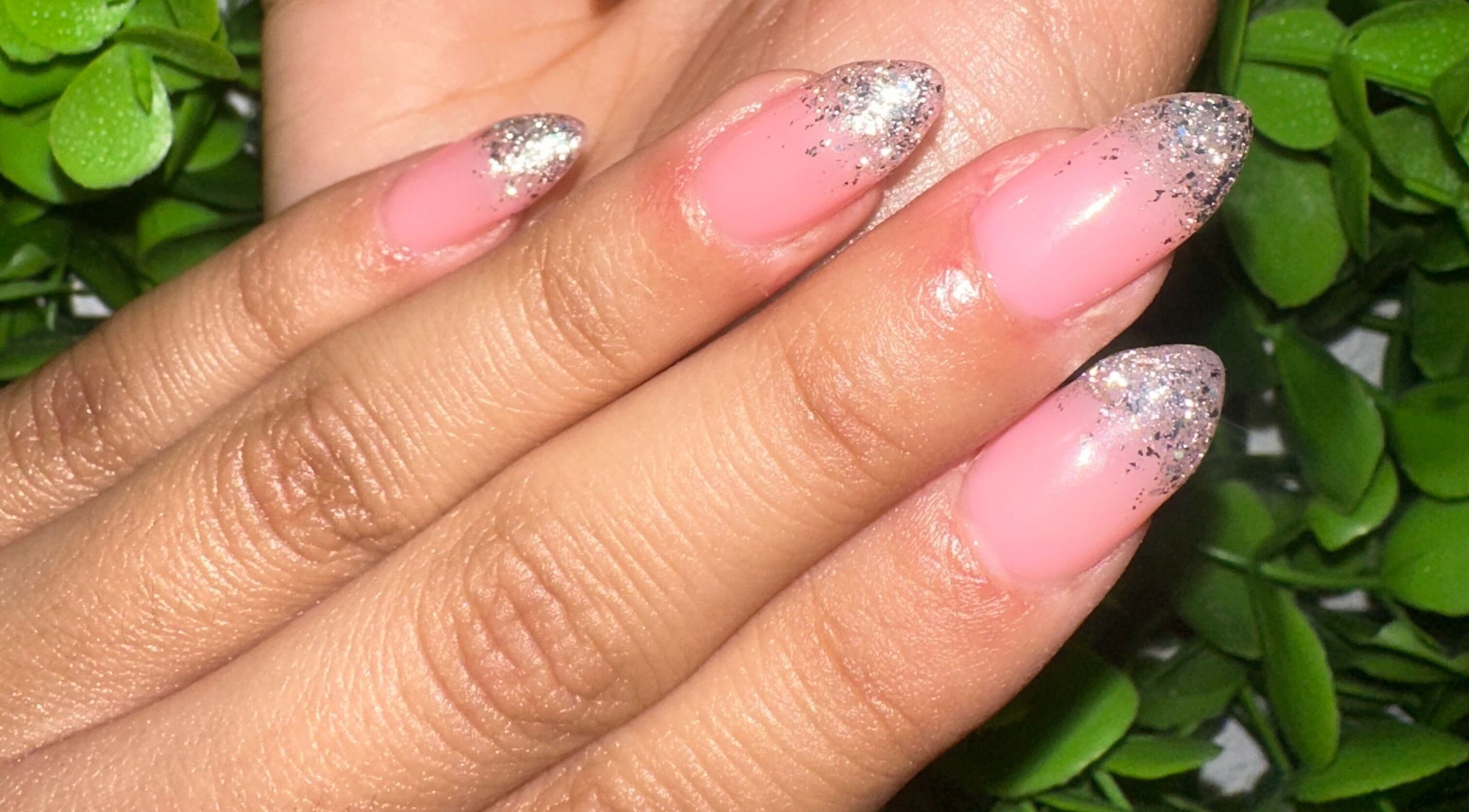Pink nails with silver glitter from Lovely Me Nail Studio, Laredo, Texas, US.