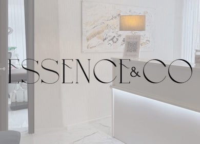 Styled reception area at Essence and Co, Quinton, England, GB showcasing modern decor and lighting.