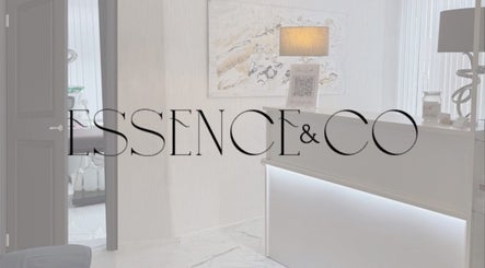 Styled reception area at Essence and Co, Quinton, England, GB showcasing modern decor and lighting.