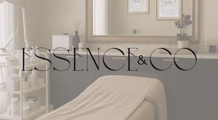 Essence and Co spa room in Quinton, England, GB, showcasing a relaxing massage table and serene decor.