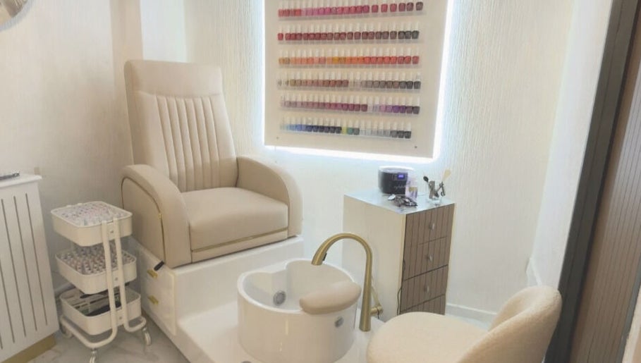 Luxurious pedicure chair and nail polish display at Essence and Co, Quinton, England, GB.