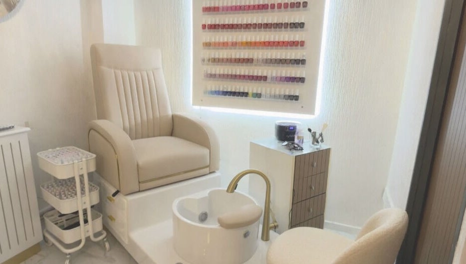 Luxurious pedicure chair and nail polish display at Essence and Co, Quinton, England, GB.