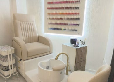 Luxurious pedicure chair and nail polish display at Essence and Co, Quinton, England, GB.