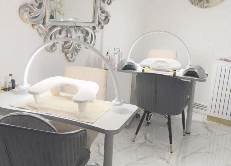 Elegant manicure station at Essence and Co, Quinton, England, GB, featuring stylish decor and high-end equipment.