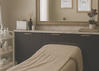 Essence and Co spa room in Quinton, England, GB with massage table and calming decor.