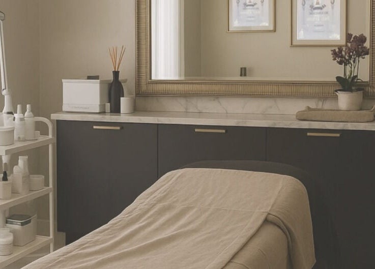 Essence and Co spa room in Quinton, England, GB with massage table and calming decor.