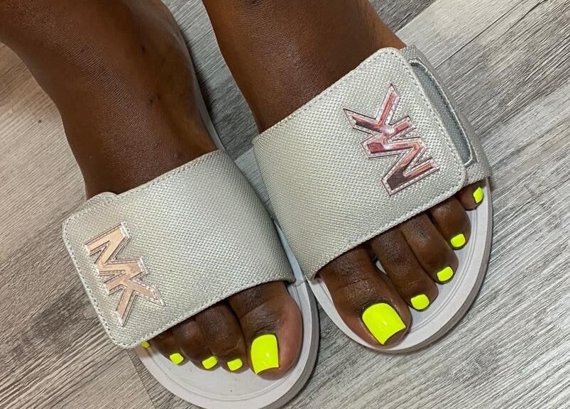 Vibrant neon pedicure in sandals at Reign Nail Studio, Saint Michael, Saint Michael, BB.