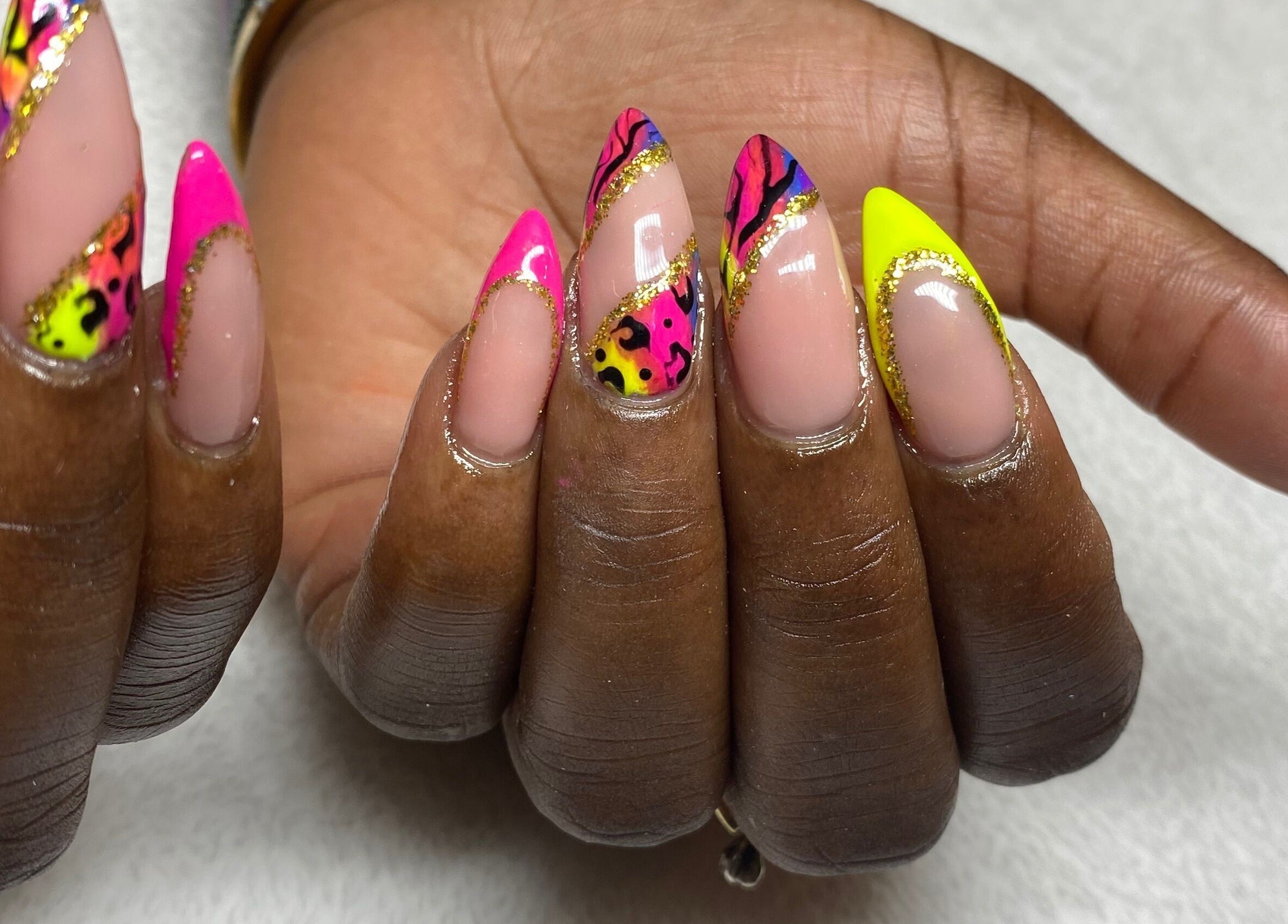 Vibrant nail art at Reign Nail Studio, Saint Michael, Saint Michael, BB, showcasing colorful and intricate designs.